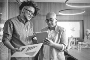 A middle manager meets with a direct report.