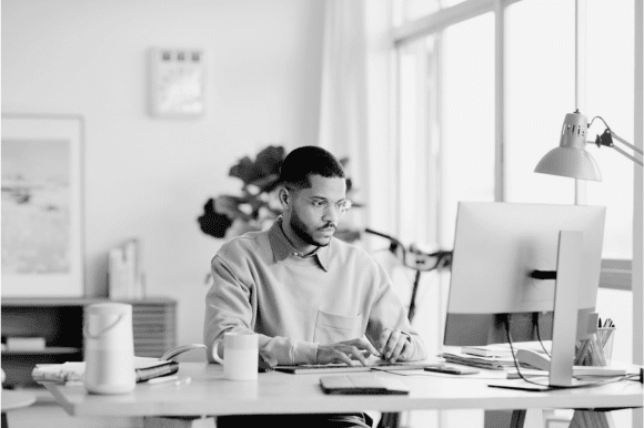 A customer service associate works in an office.